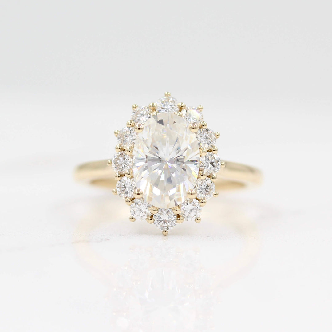 Ready to Ship Ring 14k Yellow Gold The Allie Ring (Oval) in Yellow Gold with 2ct Moissanite against a white background