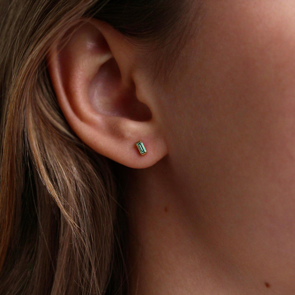 The March Baguette Birthstone Earrings with Aqua Spinel in Yellow Gold modeled