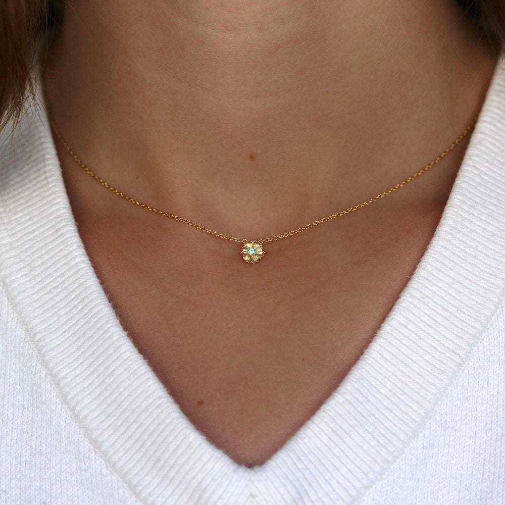 The March Poppy Birthstone Necklace with Aqua Spinel in Yellow Gold modeled