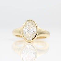 The Billie Ring (Oval) in Yellow Gold with 2ct Lab-Grown Diamond against a white background