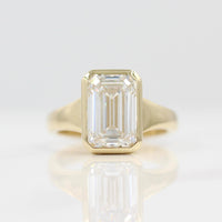 The Billie Ring in Yellow Gold with a 4ct Emerald Lab-Grown Diamond against a white background