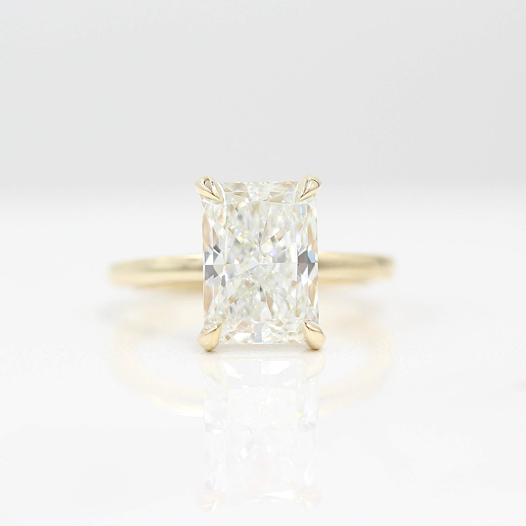 The Celeste Ring (Radiant) in Yellow Gold with 3.75ct Lab-Grown Diamond against a white background