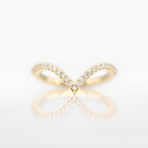 The Deep V Diamond Wedding Band in Yellow Gold against a white background