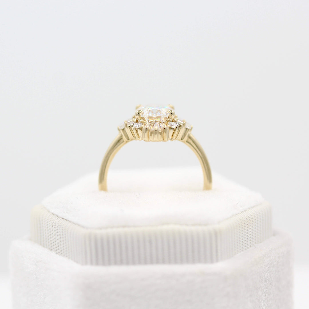 The Kortni Ring in Yellow Gold with a 2ct Oval Lab-Grown Diamond in a white velvet ring box
