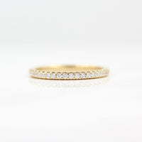 The Lauryn Wedding Band in Yellow Gold against a white background