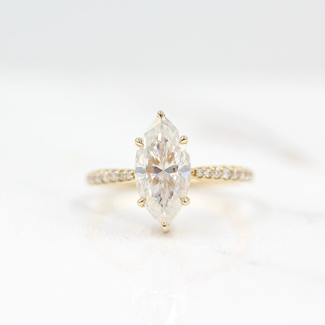 Maisie ring (marquise) in yellow gold against a white background