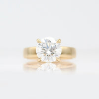 The Marilyn Ring (Round) in Yellow Gold with 3ct Lab-Grown Diamond against a white background