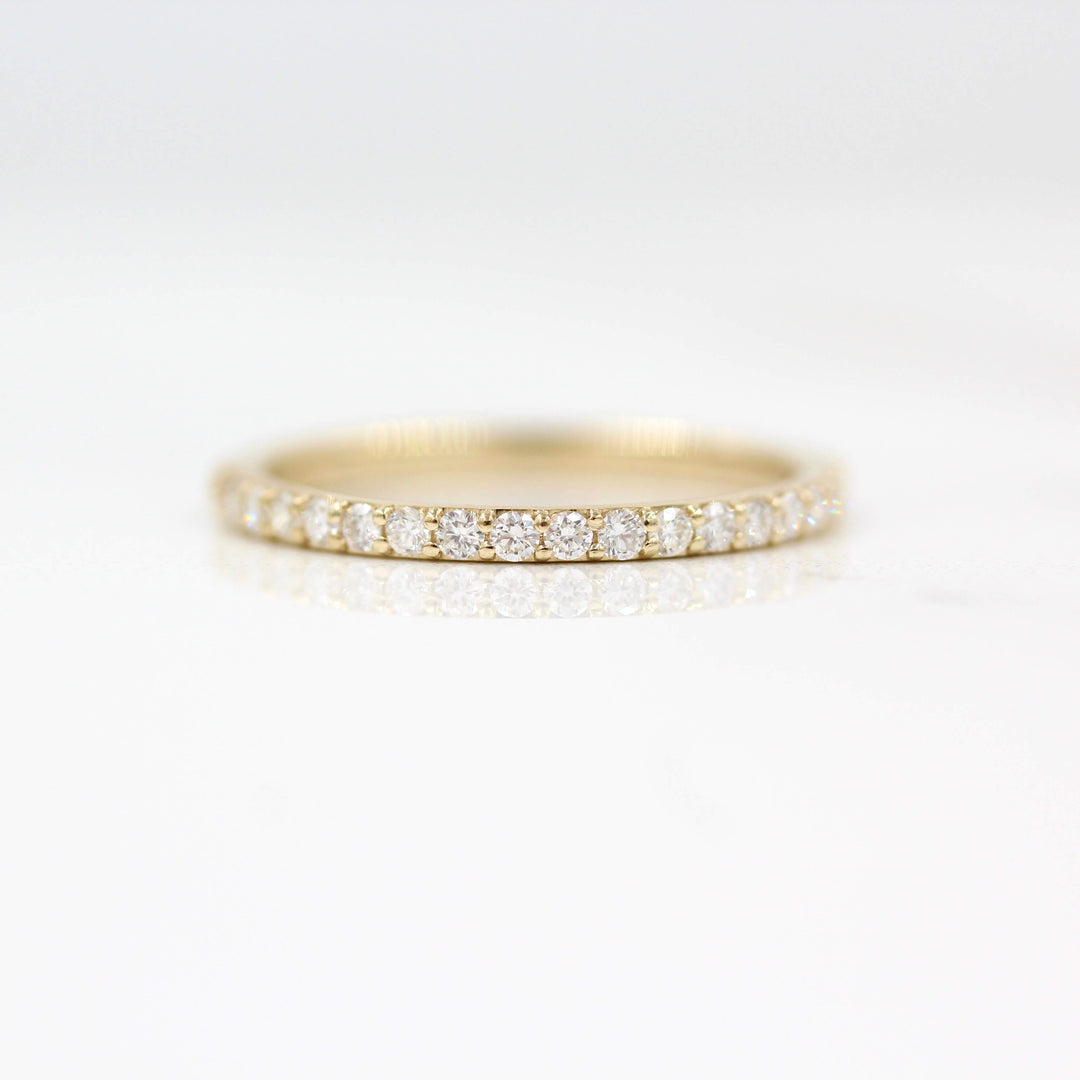The Petite Elizabeth Wedding Band in Yellow Gold against a white background