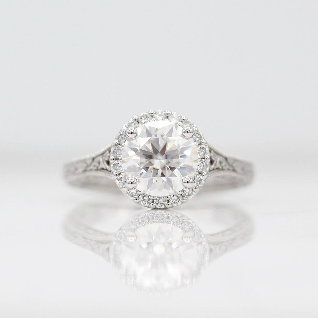 Ready to Ship Ring Colorless Moissanite / 14k White Gold / 1.5ct The Sabrina Ring (Round) in White Gold with 1.5ct Moissanite against a white background