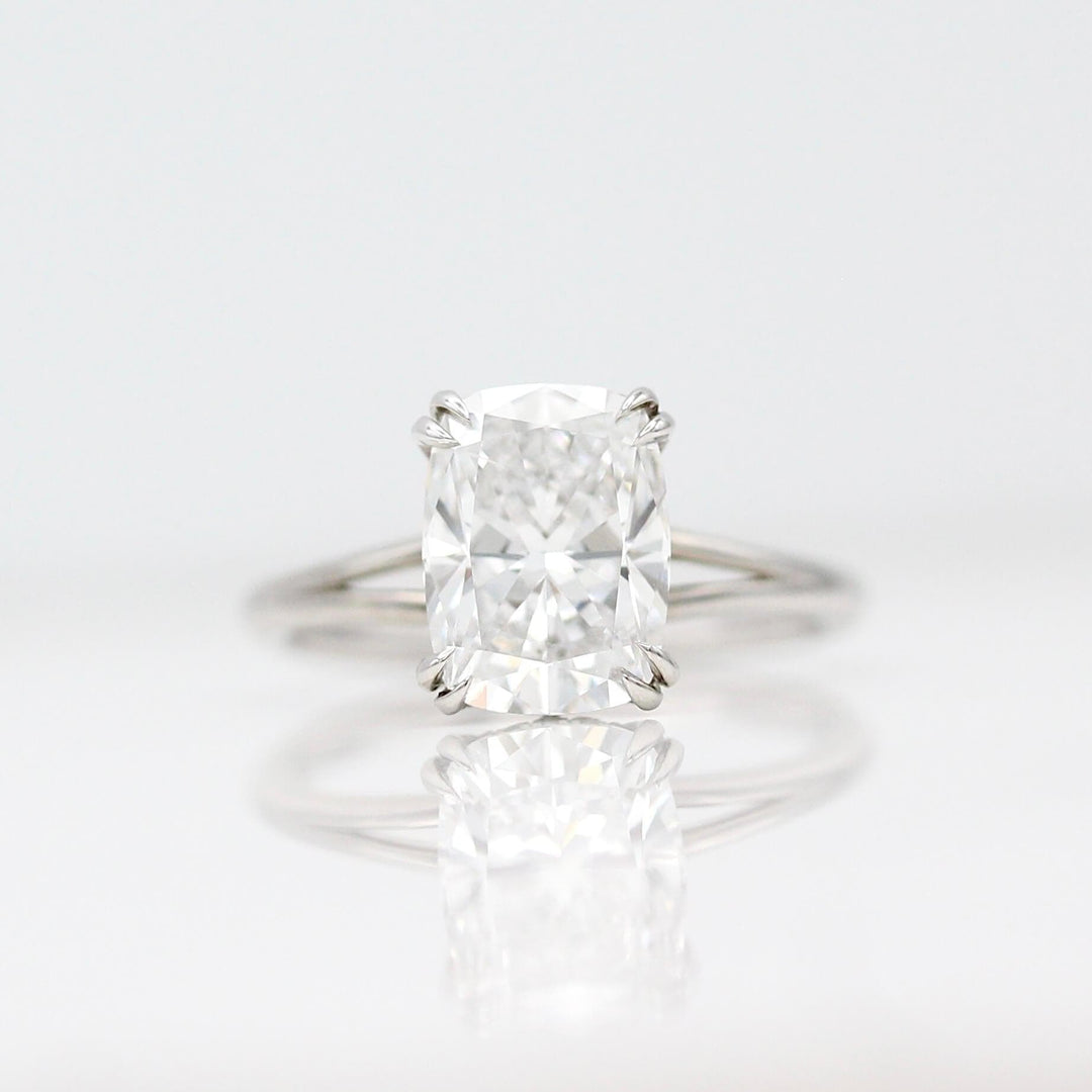 The Sage Ring in White Gold with a 3ct Elongated Cushion Lab-Grown Diamond against a white background