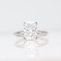 The Sage Ring in White Gold with a 3ct Elongated Cushion Lab-Grown Diamond against a white background