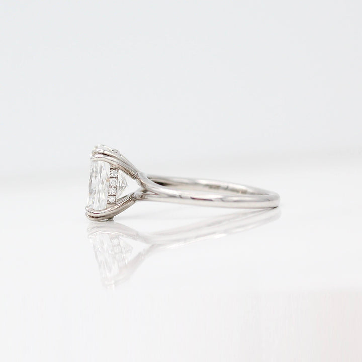 The Sage Ring in White Gold with a 3ct Elongated Cushion Lab-Grown Diamond against a white background