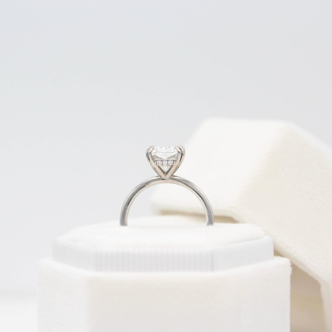 The Sage Ring in White Gold with a 3ct Elongated Cushion Lab-Grown Diamond in a white velvet ring box
