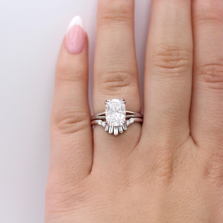 The Sunburst Wedding Band in White Gold stacked with the Sage Ring in White Gold with a 3ct Elongated Cushion Lab-Grown Diamond modeled