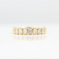 The Sammy Wedding Band in Yellow Gold against a white background