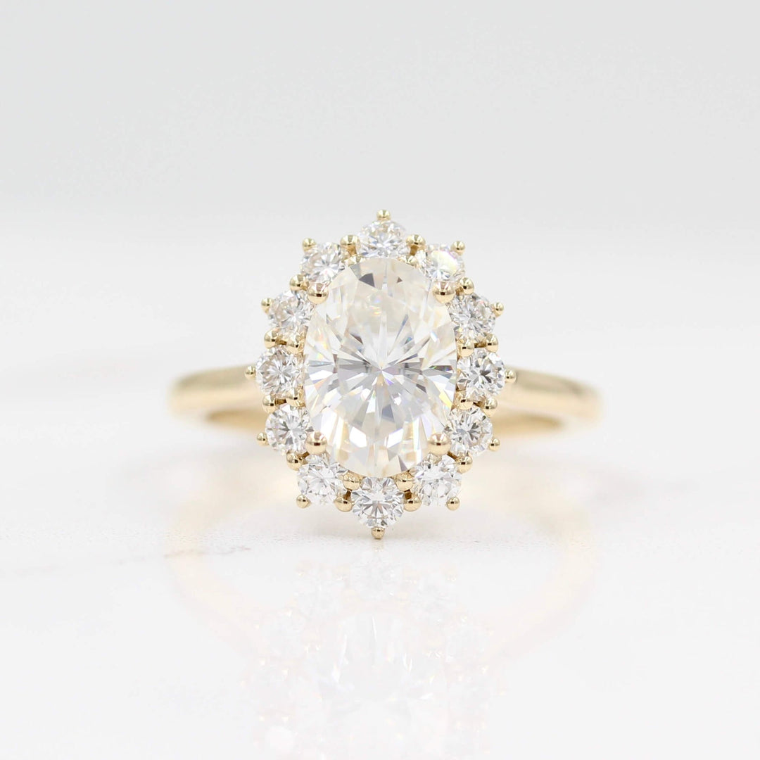 The Allie Ring (Oval) in Yellow Gold with 2ct Moissanite against a white background