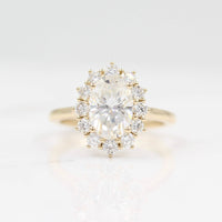 The Allie Ring (Oval) in Yellow Gold with 2ct Moissanite against a white background