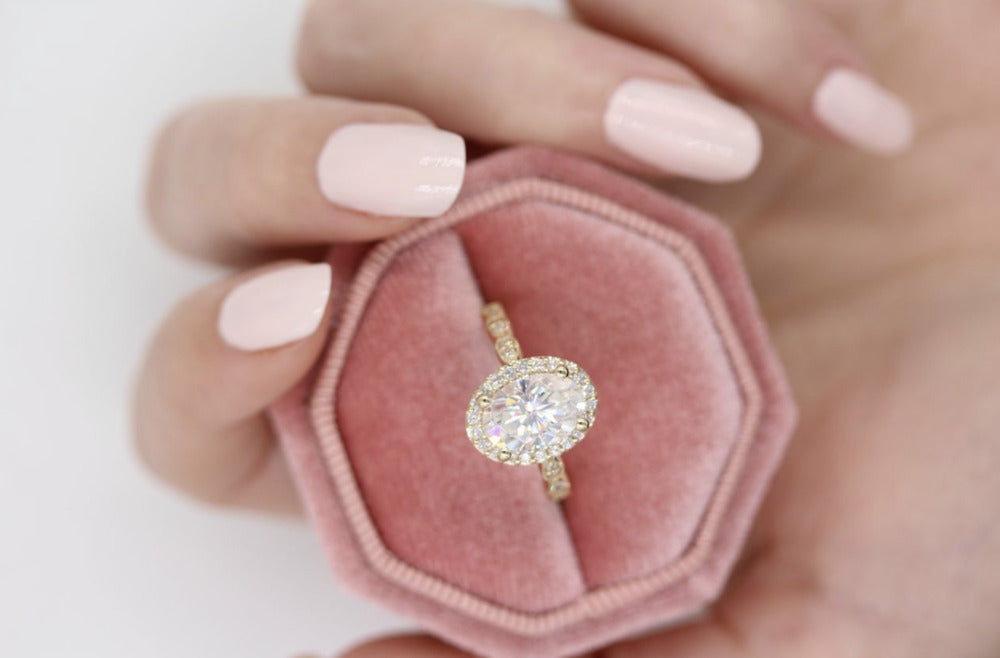 engagement ring in a pink ring box