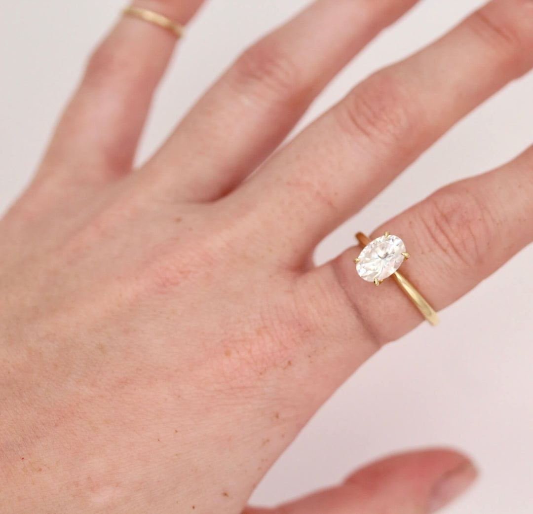 three gold rings on a ring finger