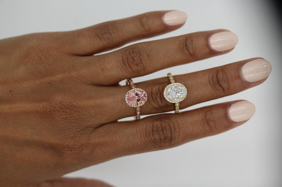yellow gold vs rose gold engagement rings on a hand