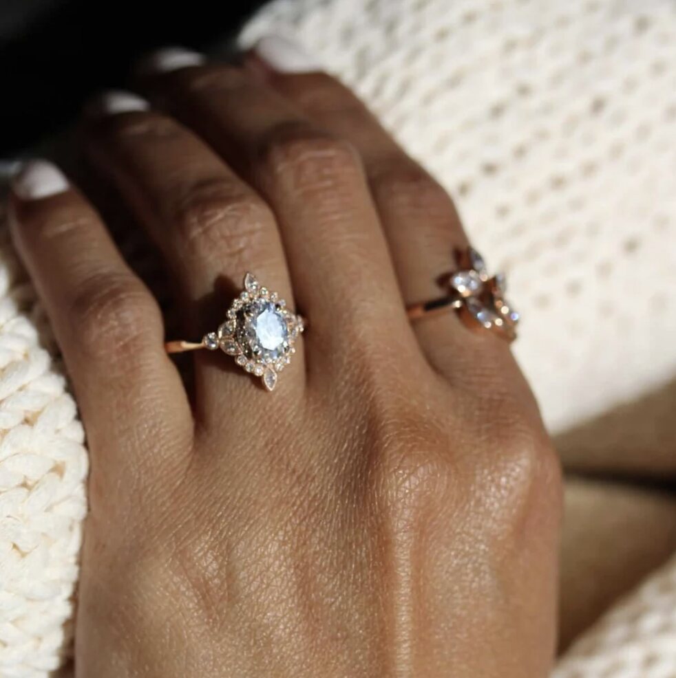 vintage-style engagement ring on a hand