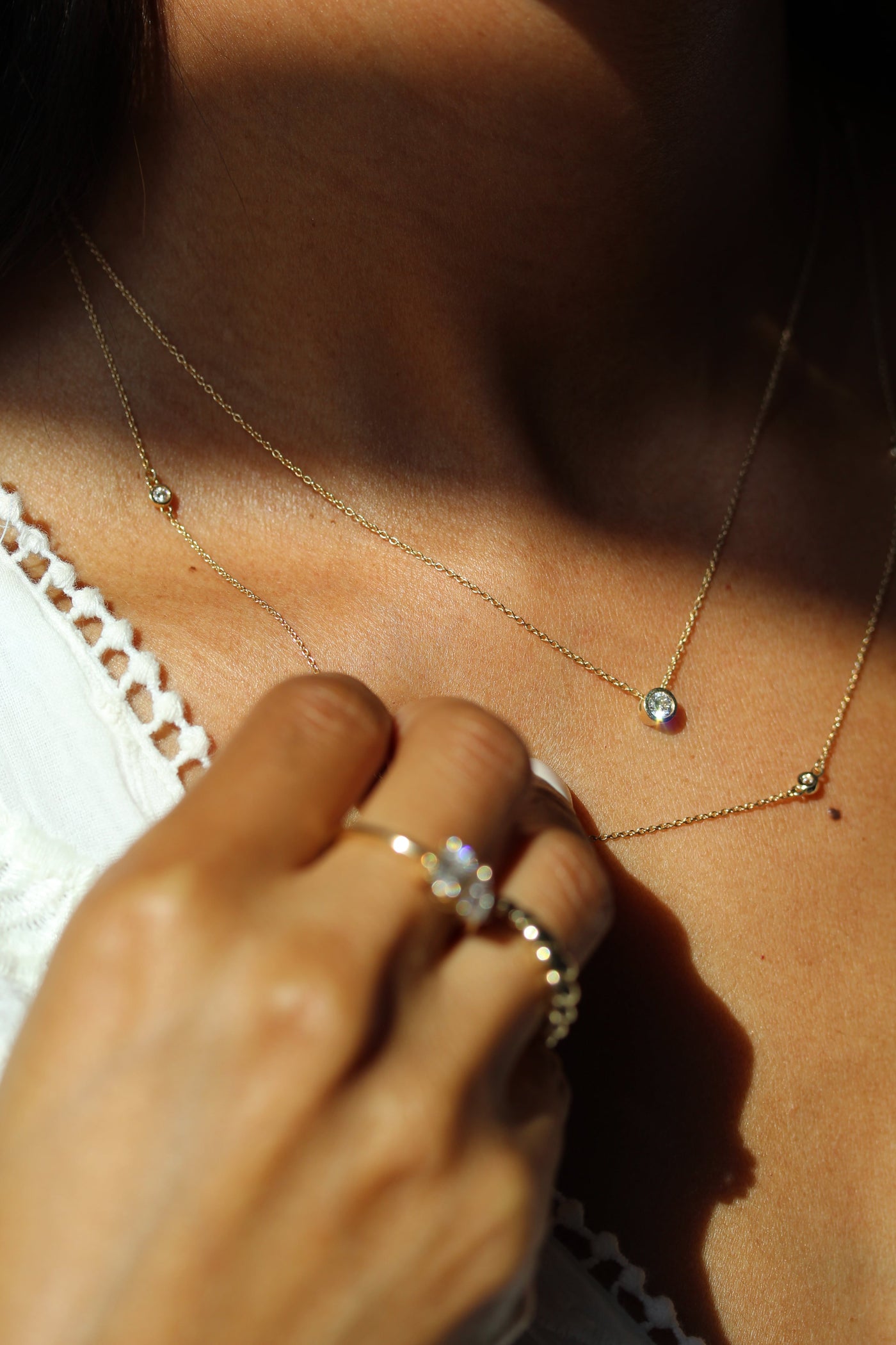 VRAI V Solitaire Round Brilliant Necklaces