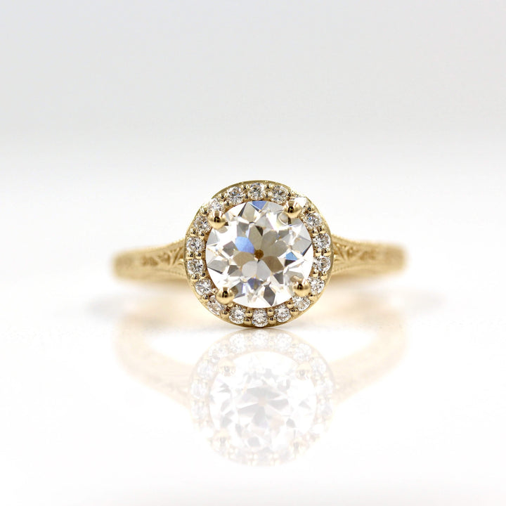 Old European cut diamond ring in yellow gold with detailed band