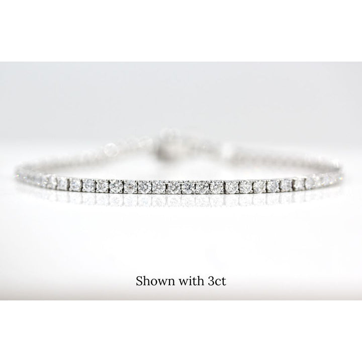 The Classic Lab Grown Diamond Tennis Bracelet in White Gold and 3ct against a white background