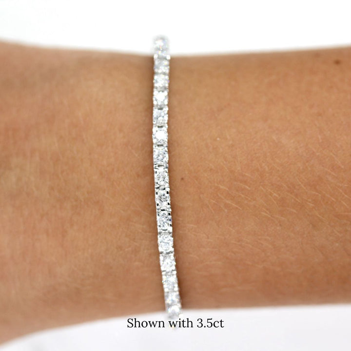 The Classic Lab Grown Diamond Tennis Bracelet in White Gold and 3.5ct modeled on a hand