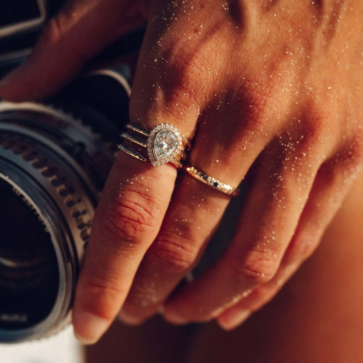 The Chelsea Ring in Yellow Gold with Moissanite modeled with the Chelsea Eternity Ring