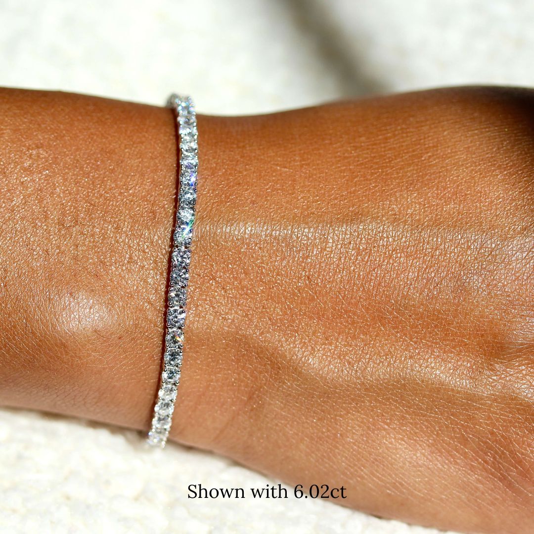 The Classic Lab Grown Diamond Tennis Bracelet in White Gold and 6.02ct modeled on a hand