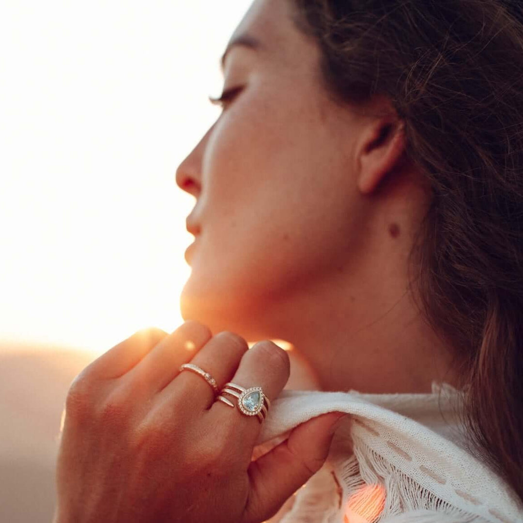 The Chelsea Ring in Yellow Gold with Moissanite modeled with the Chelsea Eternity Ring