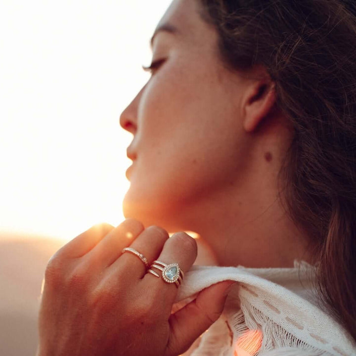 The Chelsea Ring in Yellow Gold with Moissanite modeled with the Chelsea Eternity Ring