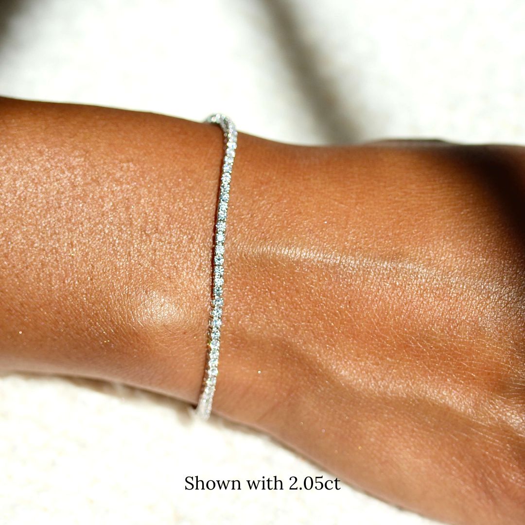 The Classic Lab Grown Diamond Tennis Bracelet in White Gold and 2.05ct modeled on a hand