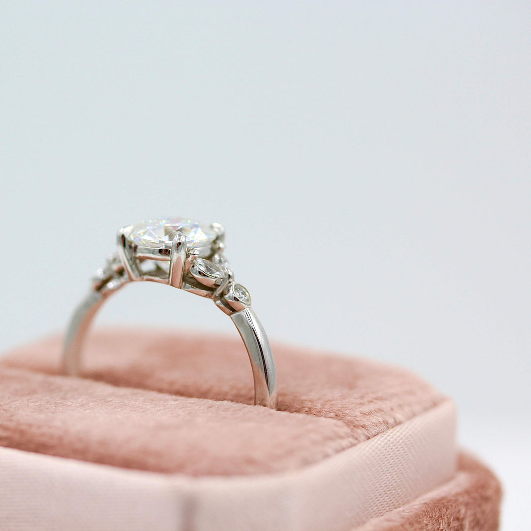 The sophia ring side profile in white gold in a velvet pink ring box