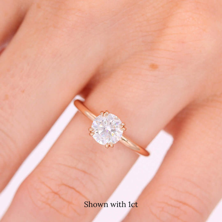 The Serena (Round) Ring in rose gold modeled on a hand