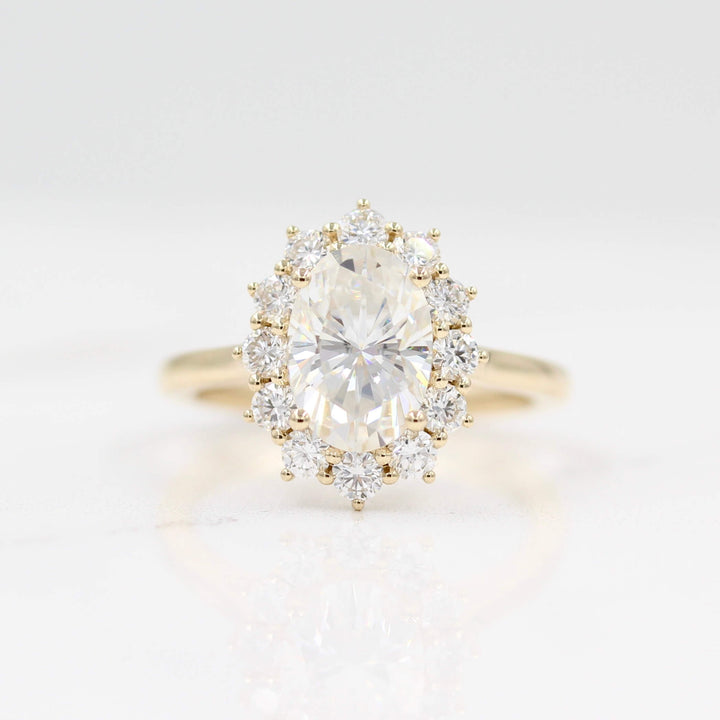 14k yellow gold Allie oval halo engagement ring with white background