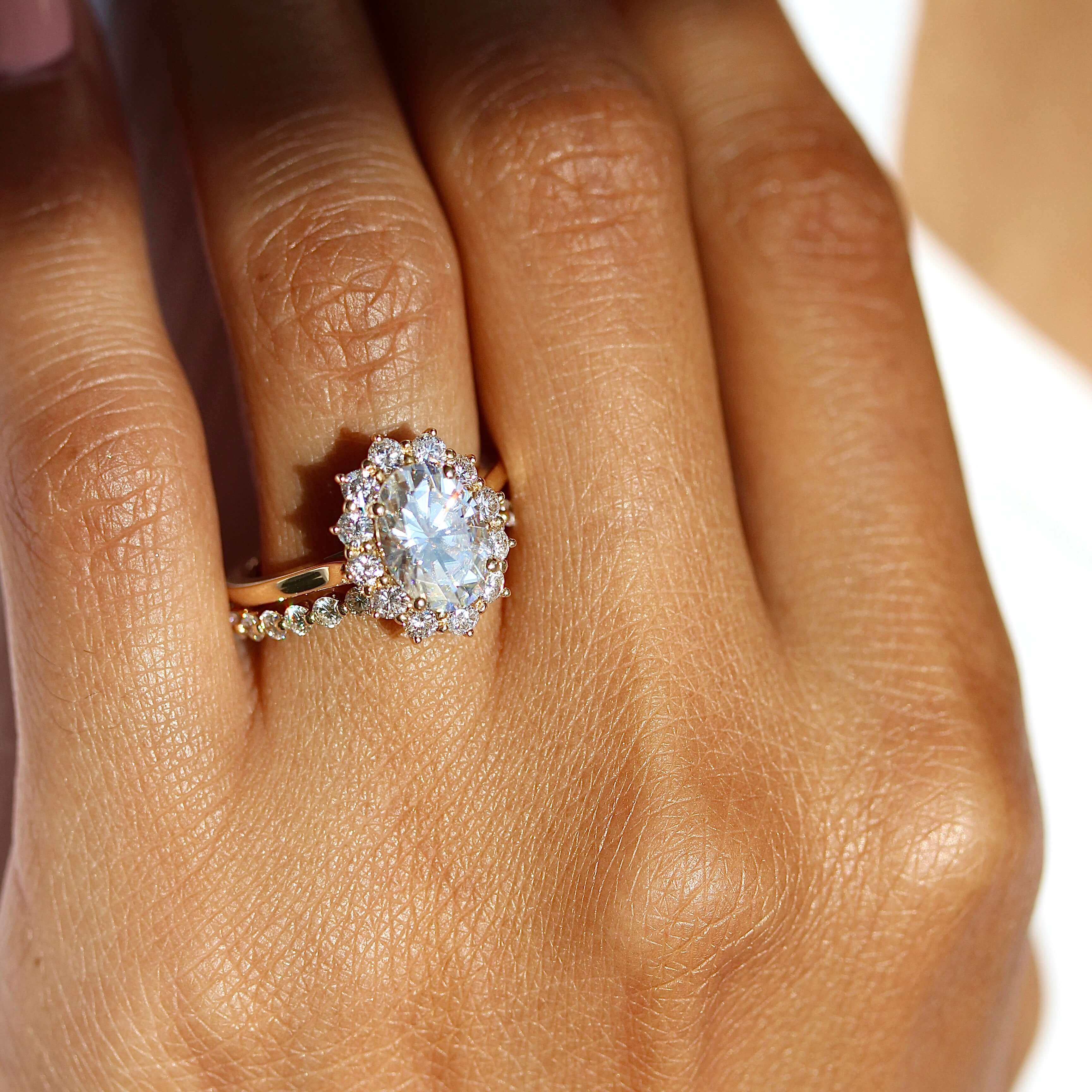 Sunburst halo engagement discount ring
