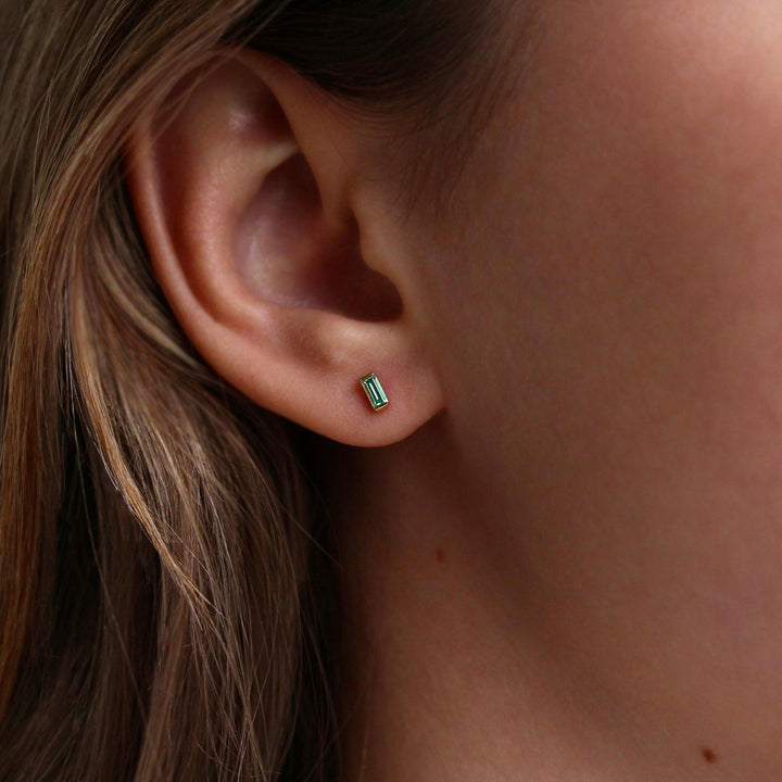 The March Baguette Birthstone Earrings with Aqua Spinel in Yellow Gold modeled