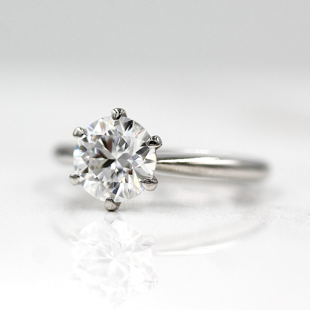 The Audrey Ring in White Gold and 1.5ct Moissanite against a white background
