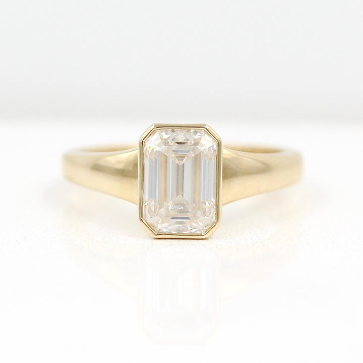 The Billie Ring in yellow gold against a white background