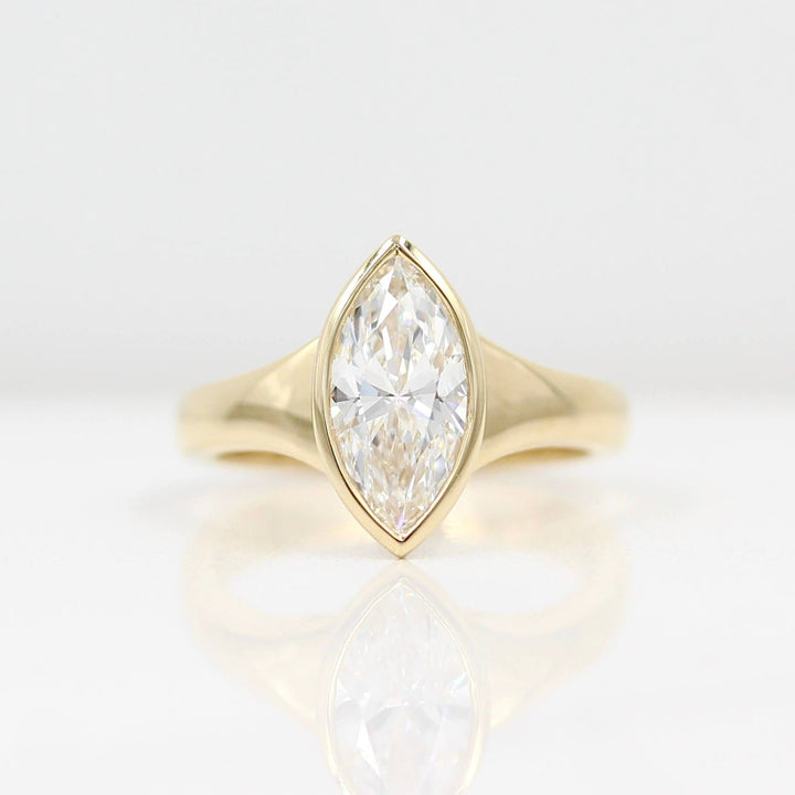 The Billie Ring (Marquise) in Yellow Gold with 1.54ct Lab-Grown Diamond against a white background