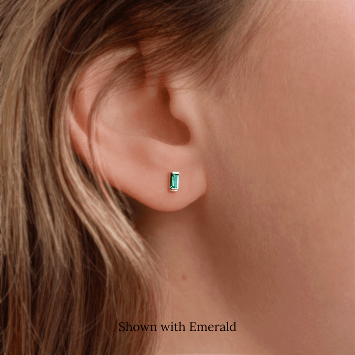 The May Baguette Birthstone Earrings with Emerald in Yellow Gold modeled