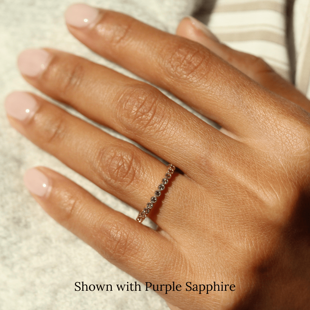 The February Florence Birthstone Band with Purple Sapphire in Yellow Gold modeled