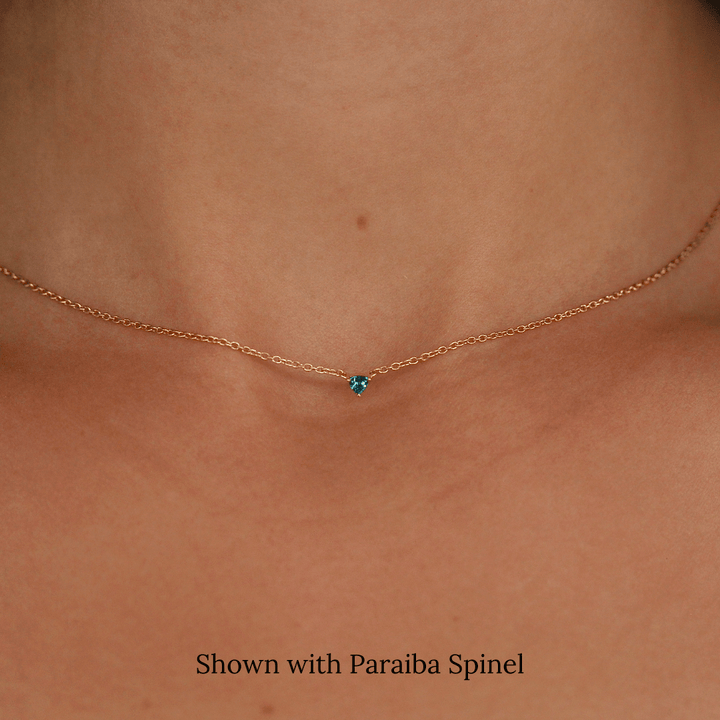 The December Tiny Trillion Birthstone Necklace with Paraiba Spinel in Yellow Gold modeled
