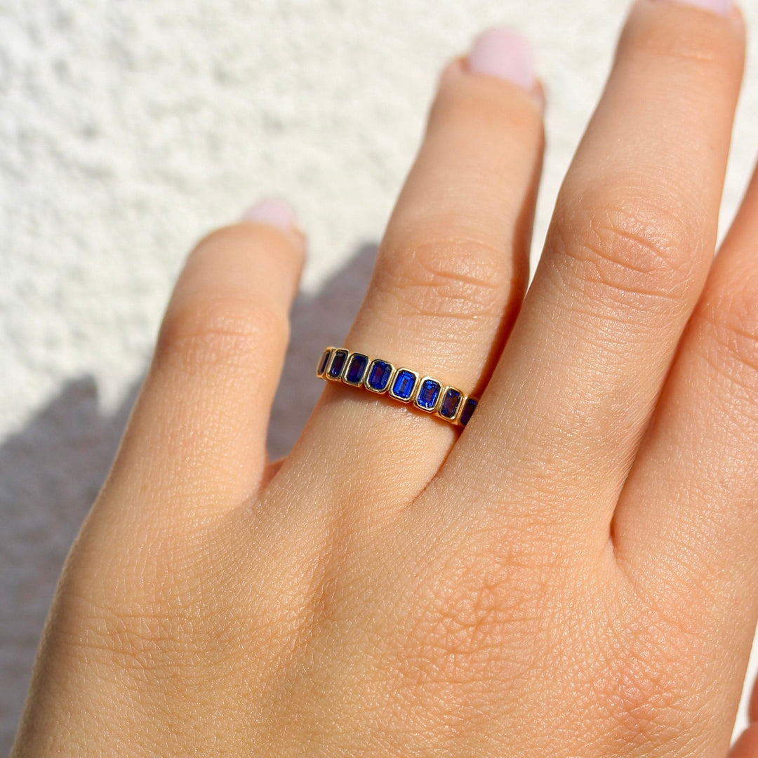 Wedding Band The Sammy Wedding Band Blue Sapphire Ermald on a hand