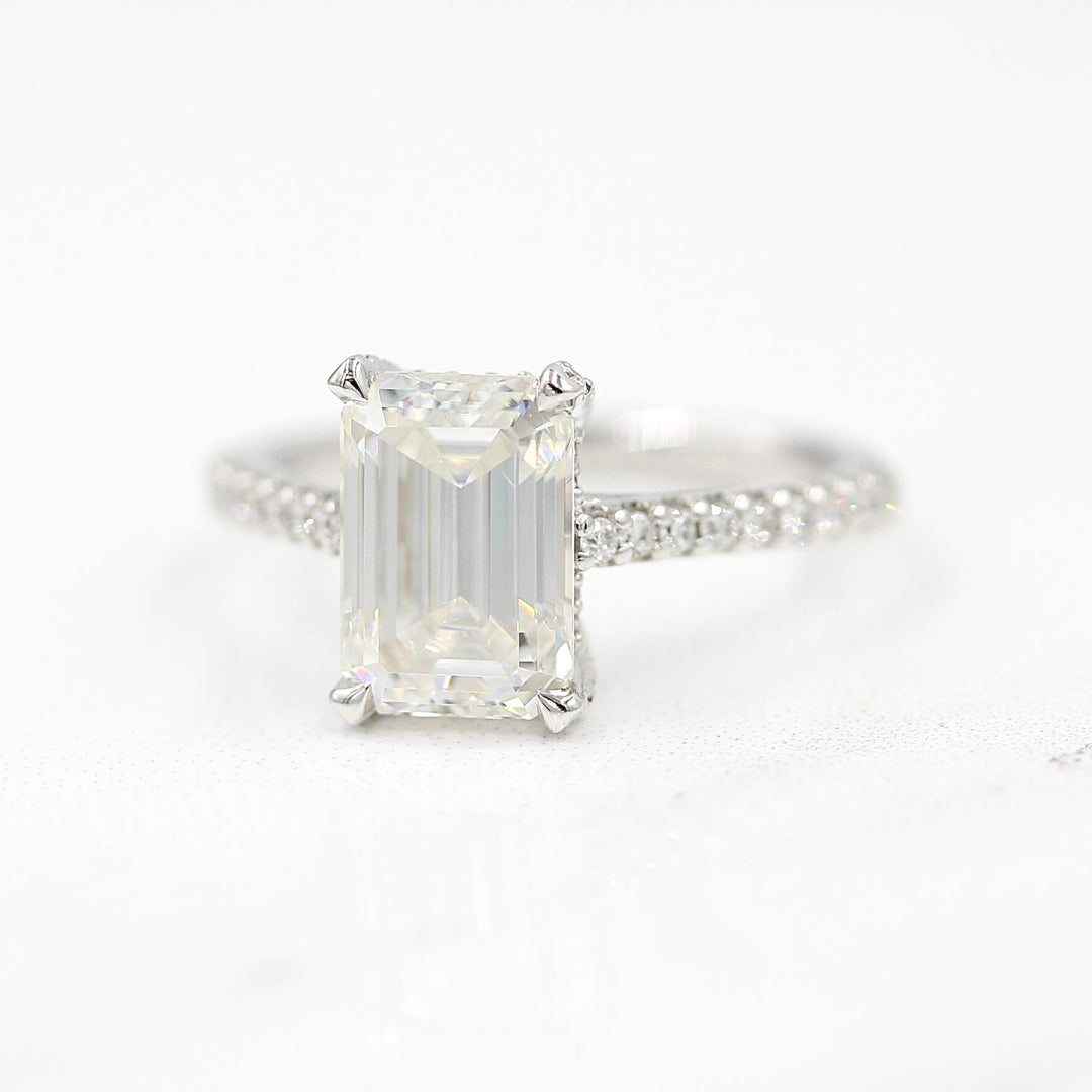 The Victoria Ring in White Gold and Moissanite against a white background