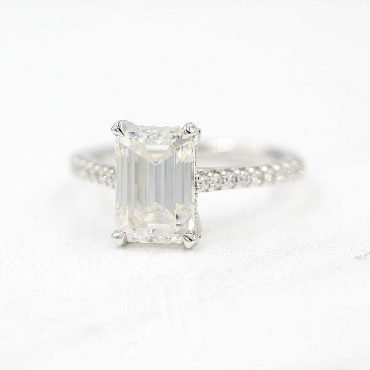 The Victoria Ring in White Gold and Moissanite against a white background
