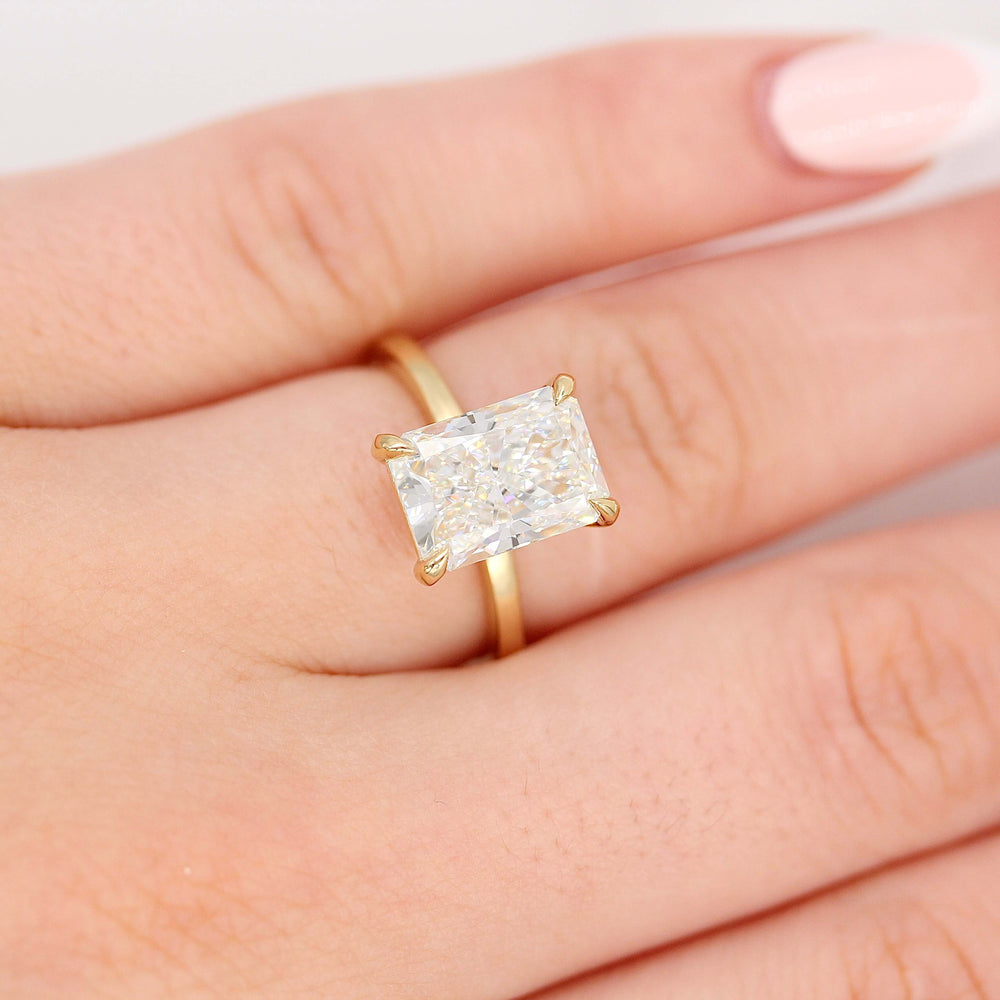 The Celeste Ring (Radiant) in Yellow Gold with 3.75ct Lab-Grown Diamond modeled on a hand