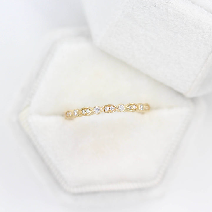 The Charlotte Wedding Band in Yellow Gold in a ring box